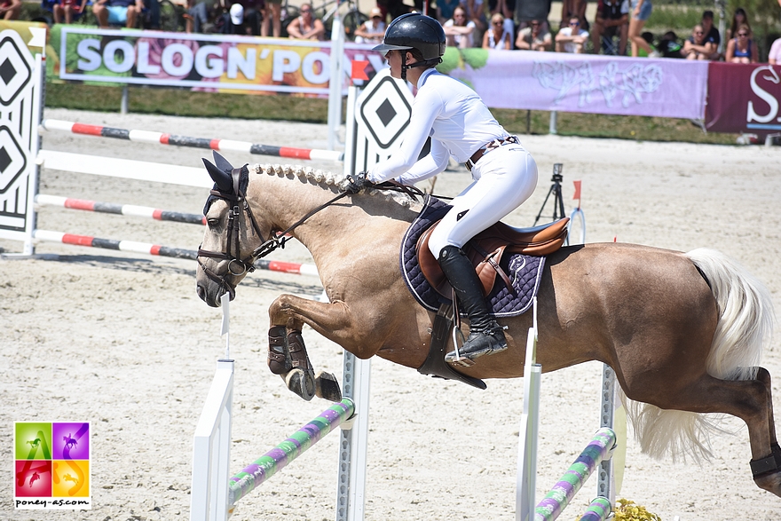 Balisto de Bosa s'octroie le titre de champion des 7 ans sous la selle de Lou Morali - ph. Poney As